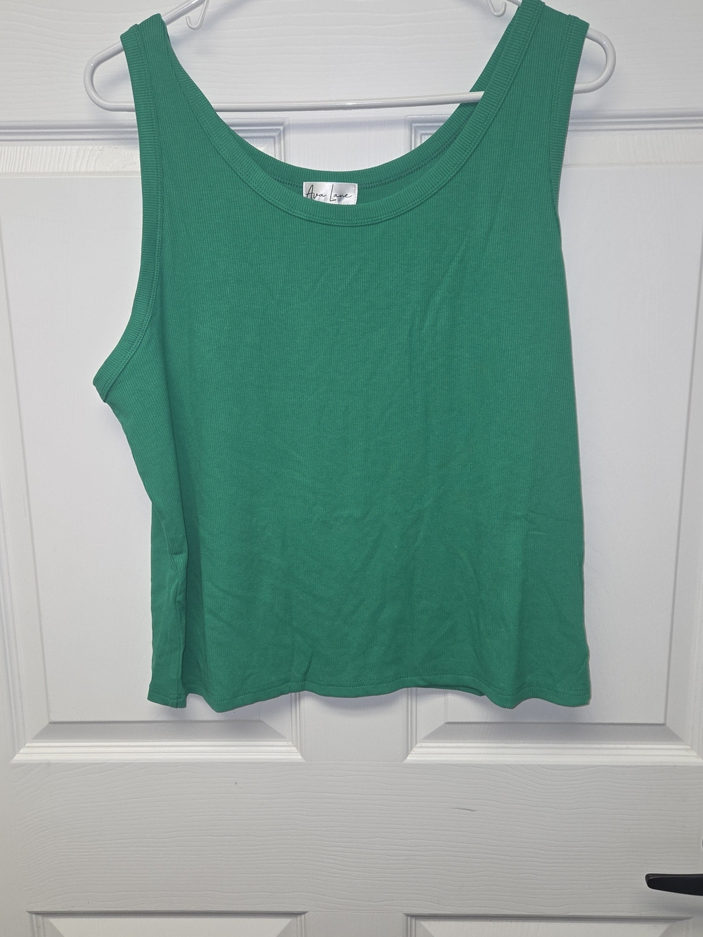 Lot of 3XL women's tops and a pair of leggings, new without tags
